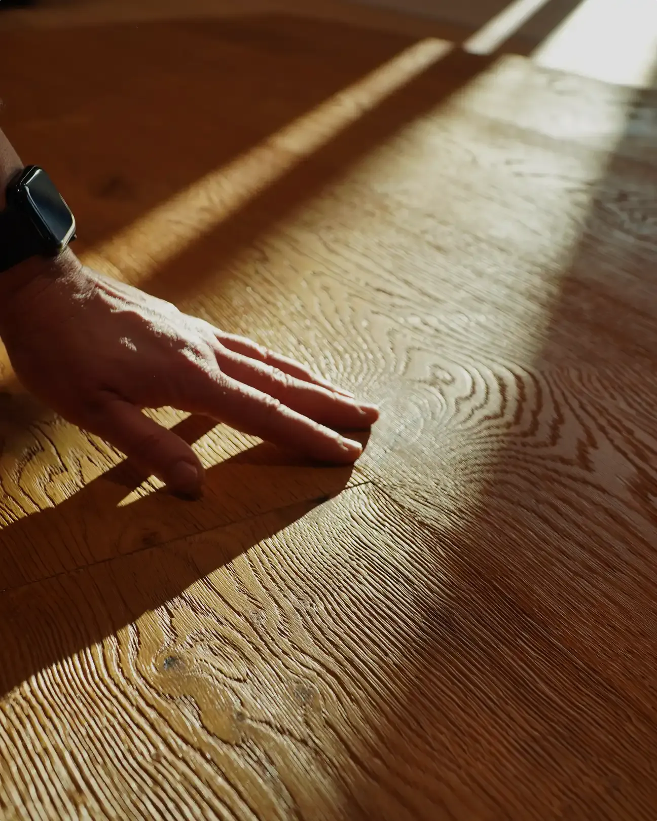 hand-touching-wood-floor-image